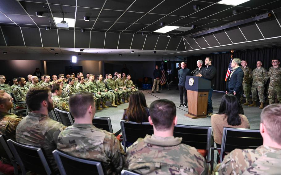 Troops listen to JD Vance speak.