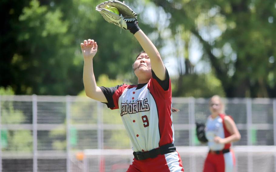 Katherine Kim catches a popup.