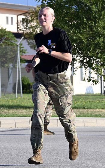 Spc. Samantha Hengehold, who placed second in a June qualifying race for the Army Ten-Miler, runs a 5K race at Del Din, Italy, on Aug. 25, 2022. 