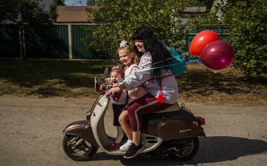 Children return to school after the summer break in Nove Zalissya. 