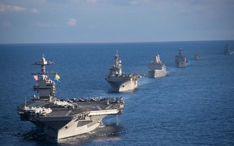 Ships from the Navy's Gerald R. Ford Carrier Strike Group and the Bataan Amphibious Ready Group as well as the Greek navy frigate HS Navarinon sail in formation in the Mediterranean Sea, Dec. 31, 2023. Ford and the cruiser USS Normandy transited the Strait of Gibraltar into the Atlantic Ocean on Jan. 5, 2024, while the Bataan Amphibious Ready Group took over the mission in the eastern Mediterranean.