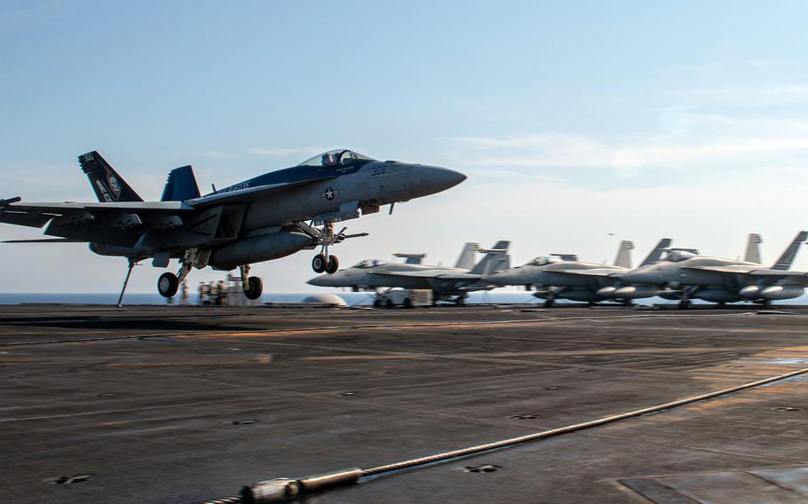 An F/A-18E Super Hornet lands on the aircraft carrier USS Harry S. Truman on Aug. 8, 2022. The Super Hornet recovered last week after being lost in the Mediterranean Sea did not have technology upgrades, which the Chinese or Russians might have hoped to exploit, experts have said.