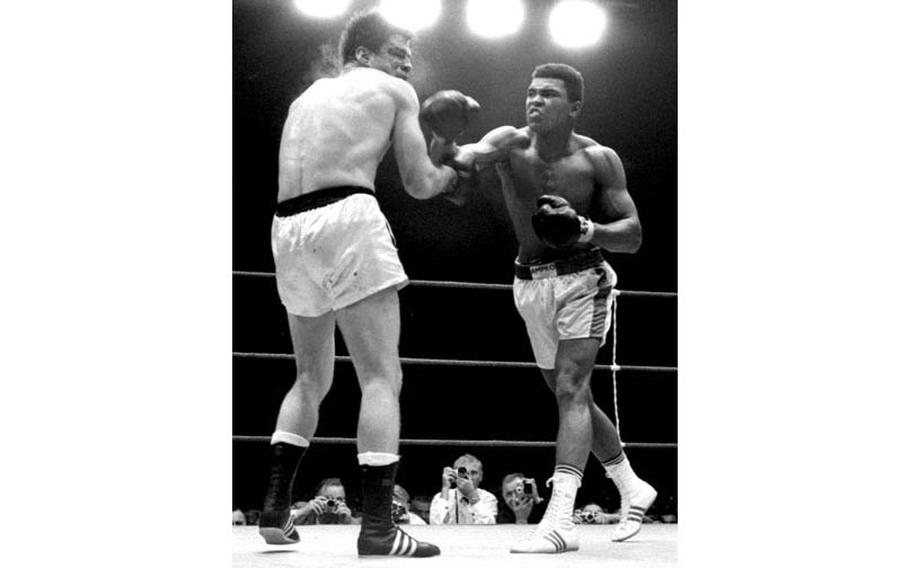 Muhammad Ali lands a right to the head of Karl Mildenberger, moments before referee Teddy Waltham stops the fight in the 12th round on Sept. 10, 1966.