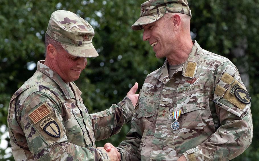 Air Force Brig. Gen. Steven Edwards, left, replaced Air Force Maj. Gen. David Tabor on June 28, 2022, as head of U.S. Special Operations Command Europe, at a ceremony in Stuttgart, Germany, Tuesday, June. 28, 2022.