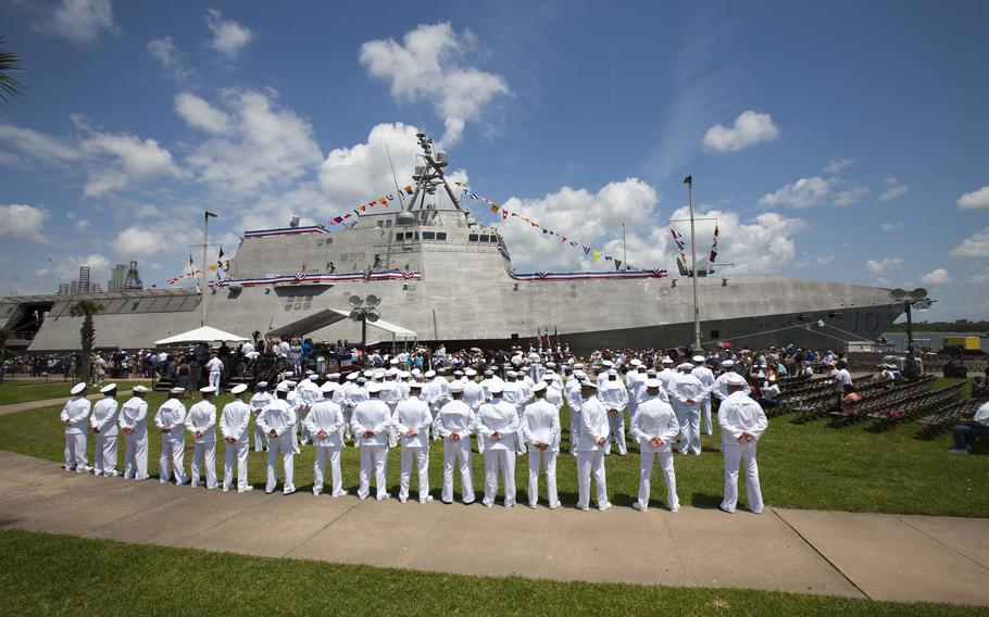 The crew of the U.S.S. Gabrielle Giffords stands at the ready prior to the commissioning ceremony on June 10, 2017, in Galveston, Texas.