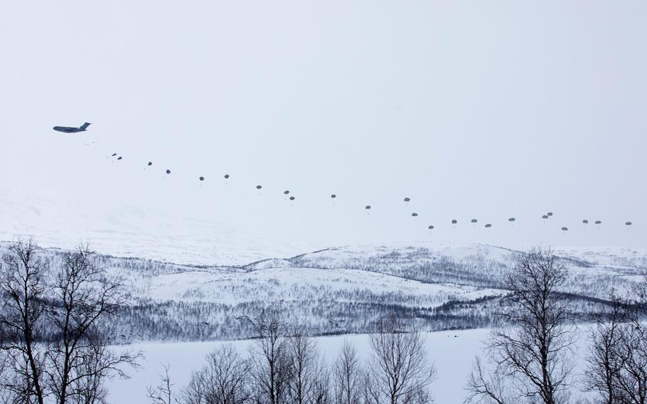 U.S. Army paratroopers from the 11th Airborne Division jump onto Norway's Lake Takvatnet on March 18, 2024. The jump followed an over-the-pole flight from Alaska, showcasing the 11th Airborne Division's capability to insert troops into the Arctic.
