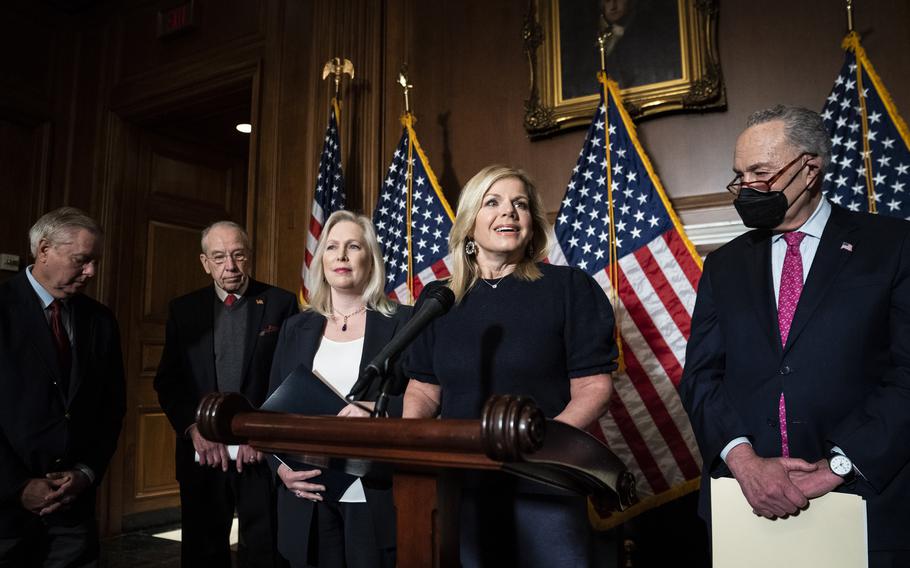 Sens. Lindsey Graham, R-S.C., left, Chuck Grassley, R-Iowa, and Kirsten Gillibrand, D-N.Y., former Fox News anchor Gretchen Carlson and Senate Majority Leader Chuck Schumer, D-N.Y., speak during a news conference to hail the passage of the Ending Forced Arbitration of Sexual Assault and Sexual Harassment Act on Capitol Hill on Thursday. 