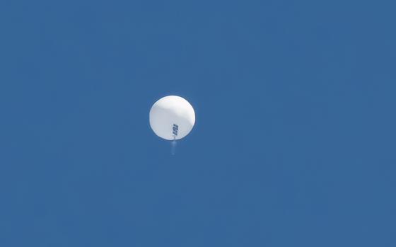 A Chinese spy balloon shortly before it was shot down over Surfside Beach, South Carolina, on Saturday, Feb. 4, 2023.
