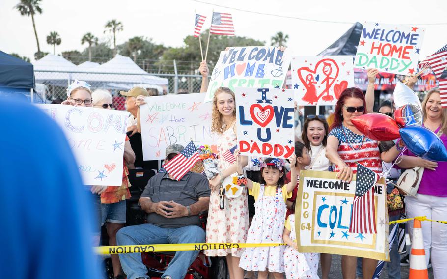 Family and friends of sailors assigned to USS Carney (DDG 64) prepare to reunite with their loved ones during the ship’s homecoming at on Sunday, May 19, 2024, Naval Station Mayport, Fla.
