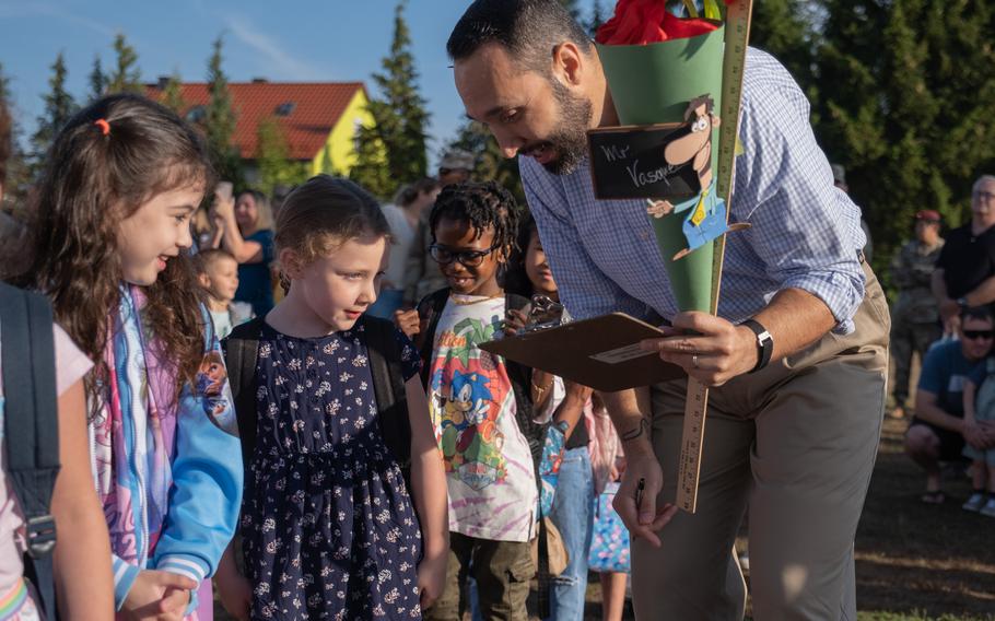 Children from Grafenwoehr Elementary School line up by grade and check in with their new teachers for the first day of school, Aug. 22, 2022, in Grafenwoehr, Germany.