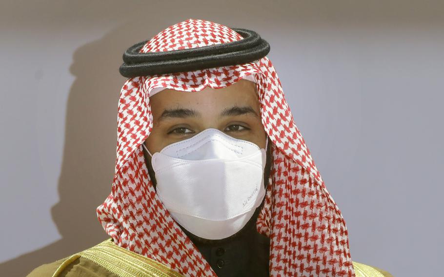 FILE - In this Feb. 20, 2021, file photo, Saudi Crown Prince Mohammed bin Salman wears a face mask to help curb the spread of the coronavirus as he attends the Saudi Cup award ceremony during the final race of the $20 million, the Saudi Cup, at King Abdul Aziz race track in Riyadh, Saudi Arabia. Top Biden administration officials on Tuesday, July 6, hosted a brother to Saudi Arabia’s powerful crown prince, Mohammed bin Salman, in the highest-level such visit known since the U.S. made public intelligence findings linking the crown prince to the killing of journalist Jamal Khashoggi. 