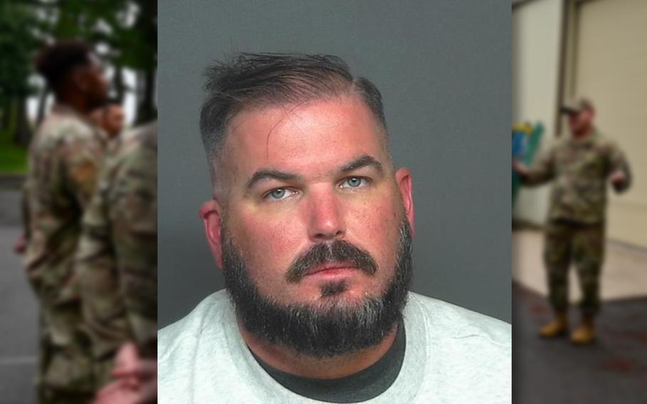 Air Force Master Sgt. Charles Bass III, as seen in his police mugshot following his Dec. 12 arrest in Surprise, Ariz. Police say he pulled a gun on a 19-year-old driver in a road rage episode near Luke Air Force Base, where he works.