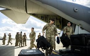 Airmen from U.S. Air Force 1st Special Operations Wing from Hurlburt Field, Fla., offload cargo from an MC-130J Combat Talon II aircraft after a temporary relocation to Wright-Patterson Air Force Base, Ohio, during Hurricane Ian, Sept. 27, 2022. 