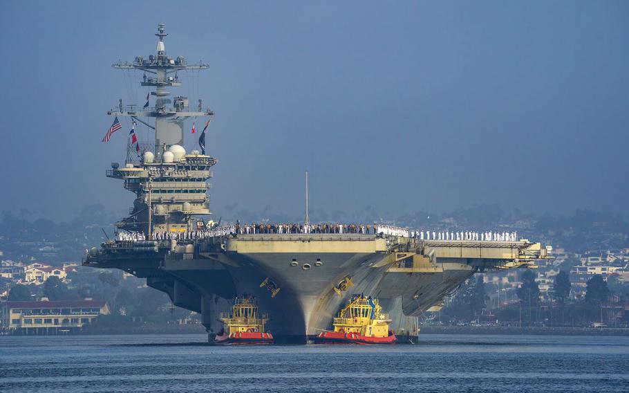 The USS Abraham Lincoln strike group makes its way into San Diego Bay as it returns from deployment on Aug. 11, 2022.