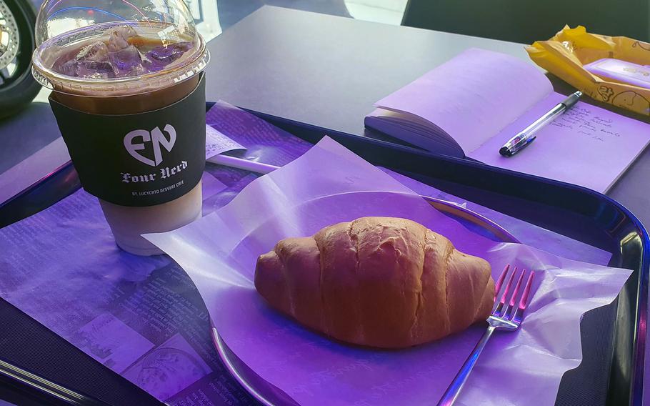 A caramel macchiato and croissant from Four Nerd in Pyeongtaek, South Korea.