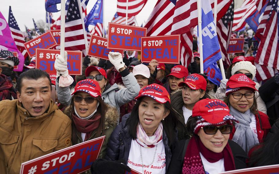 Protesters carrying Stop the Steal signs gather for a rally in Washington, D.C., on Jan. 6, 2021.