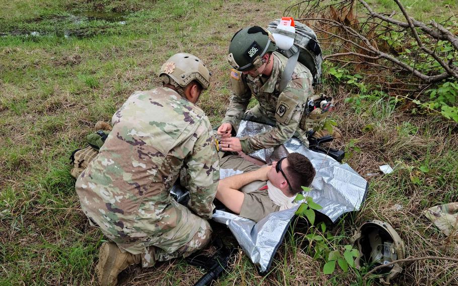Army Sergeant Tanner Welch, right, participates in a medical field training exercise outside of Fort Polk, La., in this undated photo.
