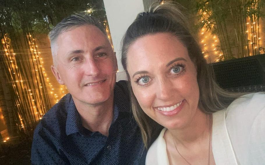 Natalie Ealy, right, with her husband who is in the Marine Corps.  Military spouse Natalie Ealy is a finalist in the Armed Forces Insurance Military Spouse of the Year competition.