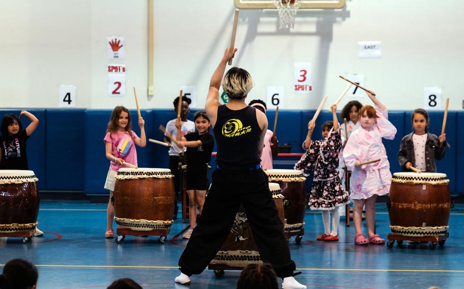 Students join a taiko performance.