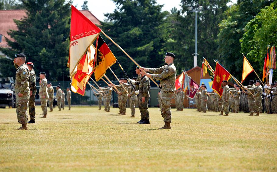 Soldiers present unit colors at the 21st Theater Sustainment  Command’s change of command ceremony at Daenner Kaserne in Kaiserslautern, Germany, on Wednesday, June 7, 2023. Brig. Gen. Ronald Ragin took command from Maj. Gen. James Smith at the ceremony.