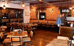 The interior of Mangiare Ristorante Italiano in Newmarket. The owners create a warm and welcoming ambience, especially during the holidays. 