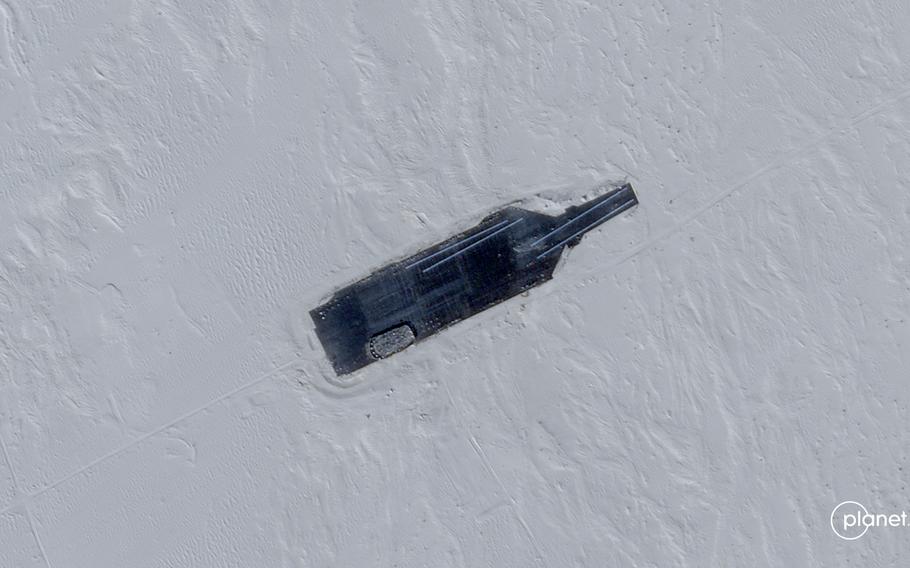 Planet Labs captured photos of China’s new mock targets on Jan. 1, 2023. This one appears to match the profile of the USS Gerald R. Ford, which entered service late last year.