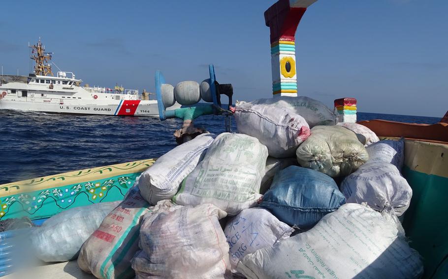 Bags of illegal drugs sit on the deck of a fishing vessel seized by U.S. Coast Guard cutter USCGC Glen Harris in the Gulf of Oman, May 10, 2023. Iran continues to supply Houthi rebels with arms, U.S. and Yemeni officials said May 11, 2023, after the U.S. Navy announced the seizure of two ships filled with heroin, which has been used to fund proxy militant groups.