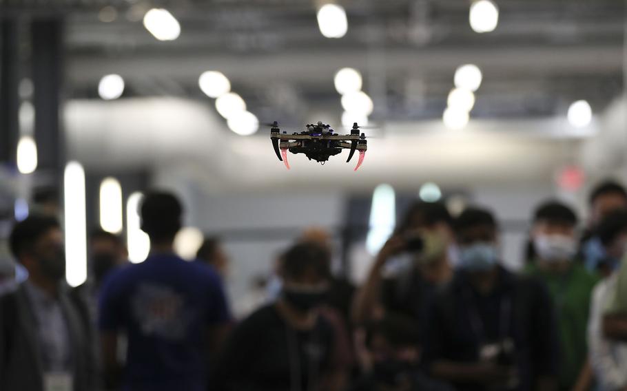 A drone flies during a demonstration in the Decentralized Planning with Shared Semantic Representation for Multiple Robots during the Penn Engineering and Applied Sciences of General Robotics, Automation, Sensing and Perception Lab (GRASP) Technical Tours at the Pennovation Center on May 23, 2022.