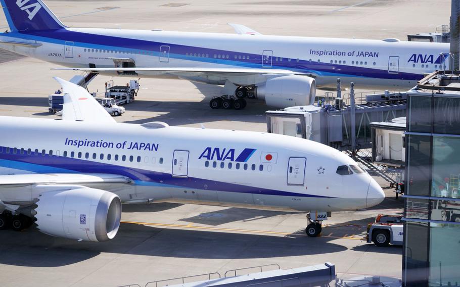 Japan's new system will routinely screen incoming travelers with symptoms, such as fever and cough, on a volunteer basis. The tests will be conducted at Narita, Haneda, Chubu, Kansai and Fukuoka airports.
