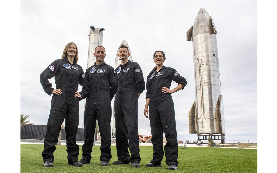 The crew of the next SpaceX private astronaut flight, called Polaris Dawn, pose at SpaceX’s Starbase facility in Boca Chica, Texas. From left: Anna Menon, who works to develop astronaut operations for SpaceX; Scott Poteet, who served as the mission director of the Inspiration4 mission; Jared Isaacman, who is financing the mission; and Sarah Gillis, lead space operations engineer for SpaceX. 