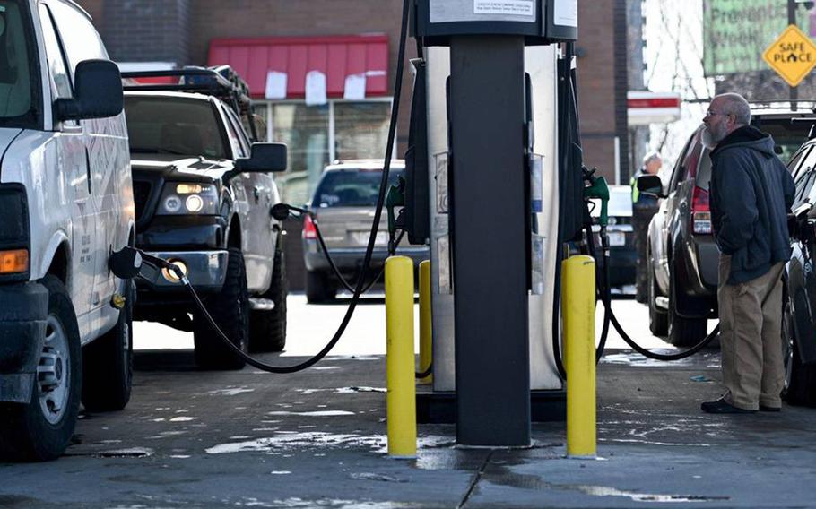 Drivers fill up at a QuikTrip in North Kansas City on March 8, 2022. After the ban of Russian oil into the United States to punish Russia for its invasion of Ukraine, gas prices have hit a record. Now the EU is considering similar measures. 