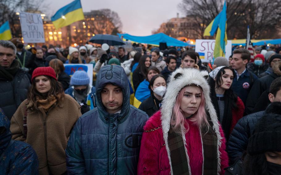 Protesters demonstrate against Russia's invasion of Ukraine across from the White House in Lafayette Square in Washington on Feb. 24, 2022.