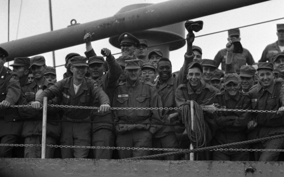 Sailors cram onto the fantail of the MSTS vessel the USS H.W. Butner, in the hopes to catch a glimpse of Elvis Presley, who was to arrive shortly onboard the Randall. The Butner docked just ahead of the incoming Randall. 