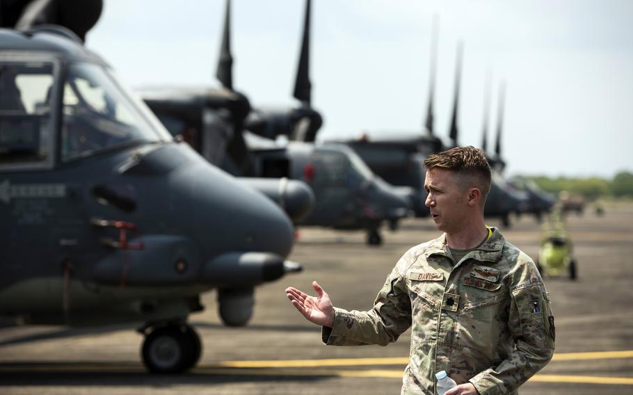 Air Force Lt. Col. Matthew Davis, commander of the 21st Special Operations Squadron at Yokota Air Base in western Tokyo, speaks to Philippine sailors about the CV-22 Osprey at the former home of Naval Air Station Cubi Point, Sunday, April 23, 2023.