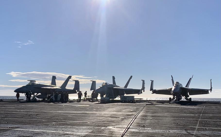 Jets sit on the deck of the aircraft carrier USS Harry S. Truman in the Adriatic Sea on Wednesday, February 2, 2022. The Truman was participating in Neptune Strike 2022, a NATO-led exercise.
