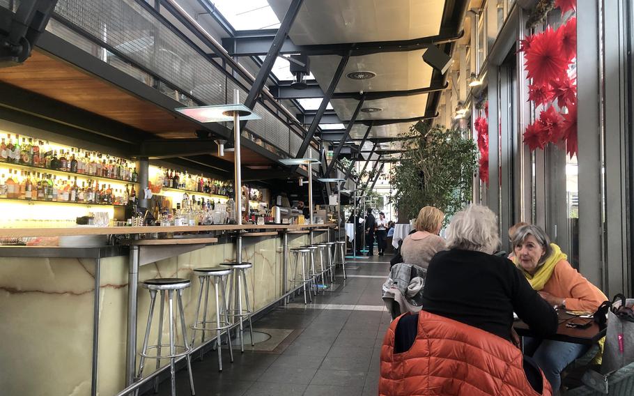 Inside Lumen in Wiesbaden, Germany. The restaurant, on the city’s market square, is open all day, serving breakfast lunch and dinner. They claim their bar is the longest in Wiesbaden.