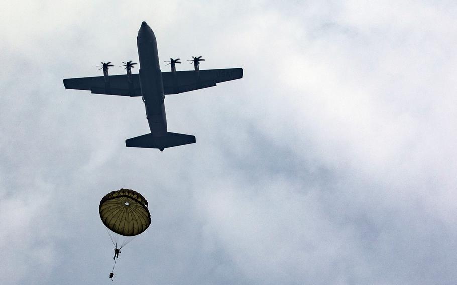 U.S., Indonesian and Japanese paratroopers take part in airborne training during the Super Garuda Shield exercise in Baturaja, Indonesia, Aug. 3, 2022.