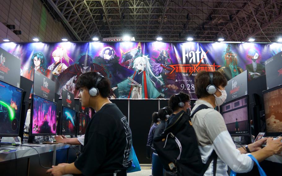 Hundreds of thousands are expected at The Tokyo Game Show 2023, where rows of game players tried out KOEI's Fate Samuri Remnant at the Makuhari Messe convention center in Chiba on Sept. 21, 2023.