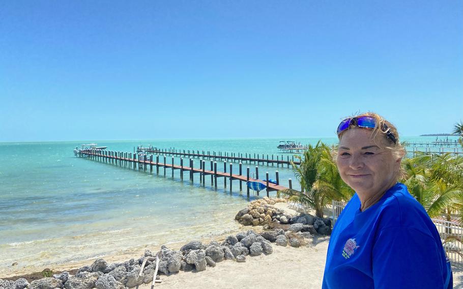 Julia Barraclough stands on the beach where she helped rescue dozens of Haitian migrants. 