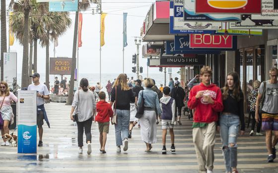 A general view of The Corso in Manly with a COVID-19 notice on Jan. 3, 2021 in Sydney, Australia. Face masks are now compulsory in certain indoor settings across NSW as the state continues to record new COVID-19 cases in the community. (Jenny Evans/Getty Images/TNS)