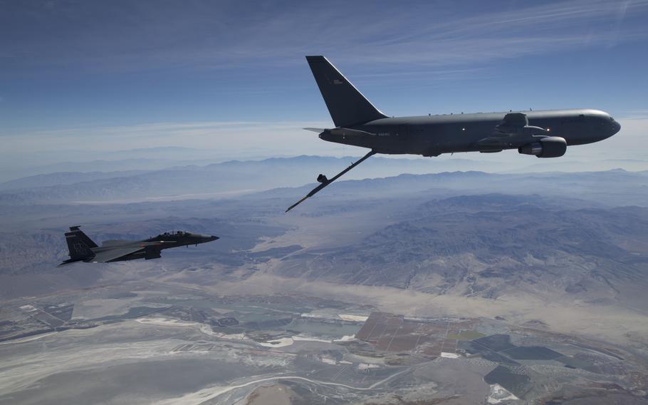 A KC-46A Pegasus aerial refueling aircraft connects with an F-15 Strike Eagle test aircraft from Eglin Air Force Base, Fla, on Oct. 29, 2018. The 418th Flight Test Squadron is conducting refueling tests with the fighter at Edwards Air Force Base, Calif.  