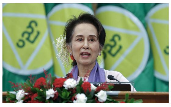 FILE - Myanmar's then leader Aung San Suu Kyi delivers a speech during a meeting on implementation of Myanmar Education Development in Naypyidaw, Myanmar, Jan. 28, 2020. Myanmar’s military says Suu Kyi has been moved from prison to house arrest as health measure due to a heat wave. (AP Photo/Aung Shine Oo, File)