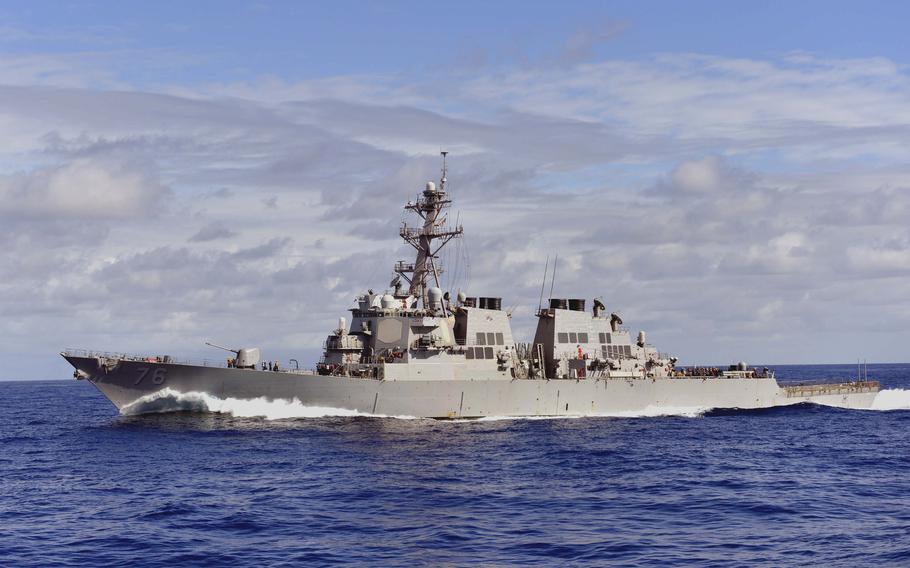 The guided-missile destroyer USS Higgins, shown here in the Western Pacific in 2013, arrived at Yokosuka Naval Base, Japan, with the destroyer USS Howard on Aug. 16, 2021.