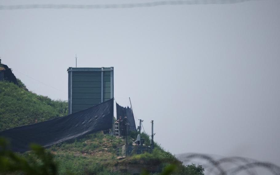 South Korean soldiers work next to a military facility (Green box) where loudspeakers dismantled in 2018 used to be, near the demilitarized zone separating the two Koreas in Paju, South Korea, June 10, 2024.
