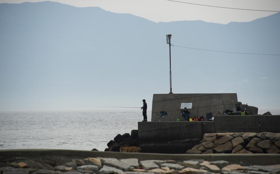 There's more to do on a daytrip to Aoshima, Japan, than pet the cats. It's a good spot for some fishing.