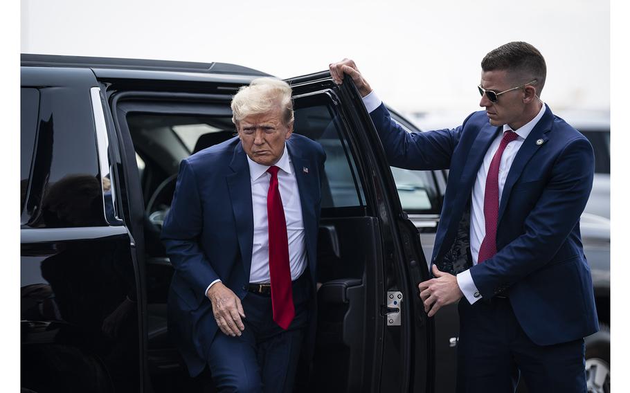 Former President Donald Trump exits a vehicle to board a plane June 10, 2023, in Newark, N.J.