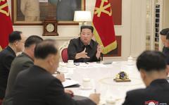In this photo provided by the North Korean government, North Korean leader Kim Jong Un, center, attends a meeting of ruling party Workers' Labor Party of Korea in Pyongyang, North Korea Tuesday, May 17, 2022. North Korea on Wednesday, May 18, reported 232,880 new cases of fever and another six deaths as leader Kim Jong Un accused officials of “immaturity” and “slackness” in handling the escalating COVID-19 outbreak ravaging across the unvaccinated nation.