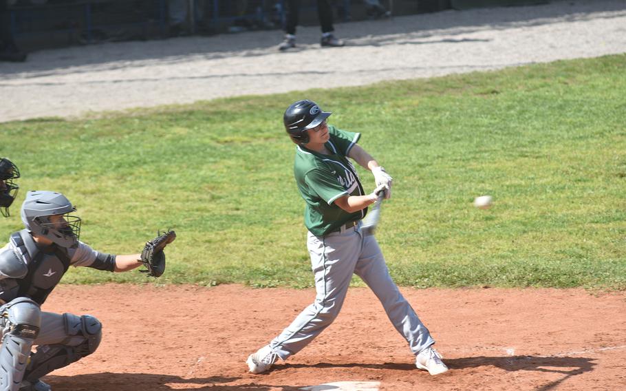Naples’ Brady Price sends the ball into play Saturday, April 20, 2024, in a game against the Vicenza Cougars. The Wildcats won both games to stay unbeaten.