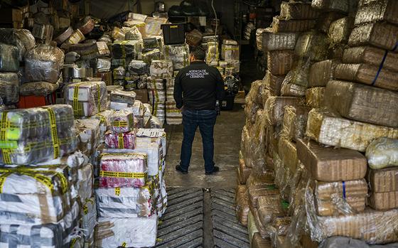 Officials from Mexico's attorney general's office unloaded hundreds of pounds of fentanyl and methamphetamine seized near Ensenada. MUST CREDIT: Washington Post photo by Salwan Georges