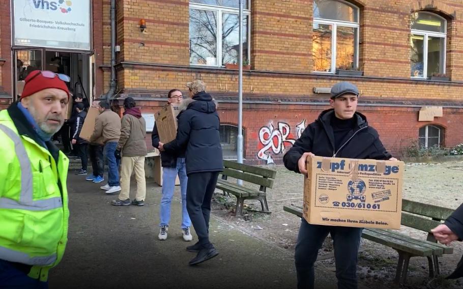 A screenshot from a video of volunteers moving boxes of donations. Germany’s Turkish diaspora, the largest in the world, organized donations to send to victims of a powerful earthquake on Feb. 6 that rattled Turkey and Syria.